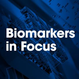 Bold white text reading "Biomarkers in Focus" floating on top of a two-tone black and blue image of a nanosensor. 