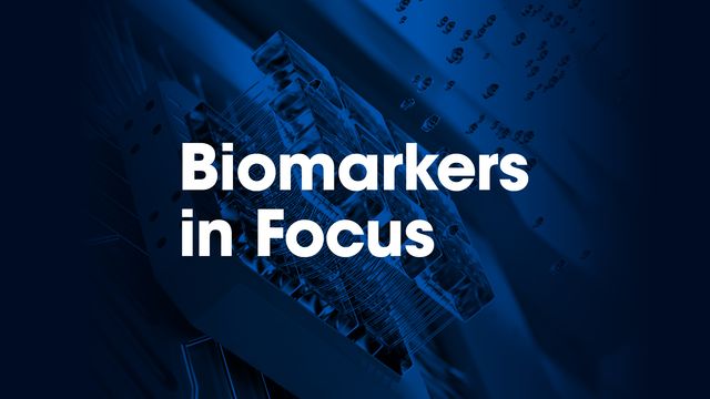 Bold white text reading "Biomarkers in Focus" floating on top of a two-tone black and blue image of a nanosensor.