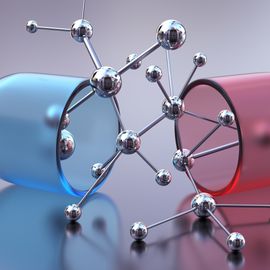 Molecular structure emerging from capsules, symbolizing drug discovery in functional proteomics. 