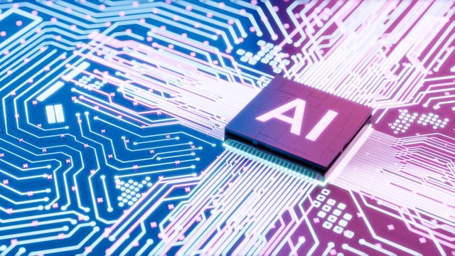 A digital render of a computer chip with the letters "AI" on it, with blue and pink connections streaming out of it.
