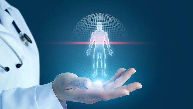 Doctor holding holographic human figure symbolizing clinical mass spectrometry diagnostics.