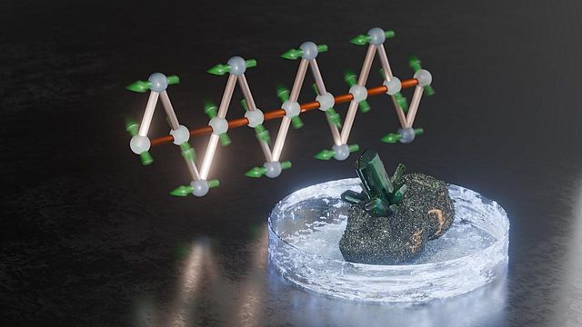 An artist's representation of the magnetic structure of atacamite in the background, with a piece of the green-ish crystal sitting on a circular slab of ice in the foreground.