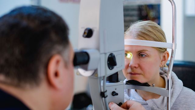 Women having her eyes tested.