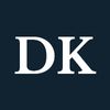 White letters "DK" on a navy background.
