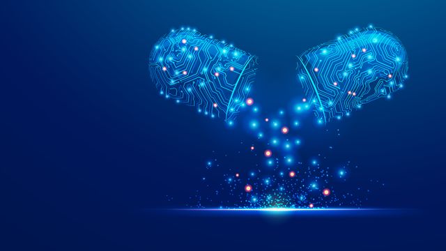 A blue open drug pill made from circuit boards, representing AI-driven drug discovery.