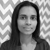 A greyscale headshot of Neeta Ratanghayra