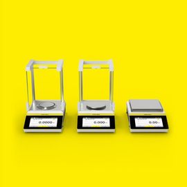 Three Quintix® Pro laboratory balances on a yellow background 