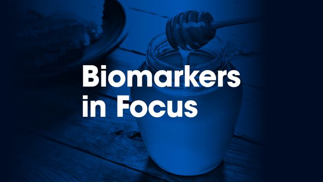 A graphic of a jar of honey, in blue, with the text "Biomarkers in Focus" in the foreground.