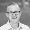 Black and white headshot of Tyler Brown.